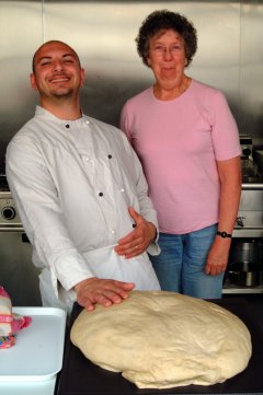 Marian Checking Out the Pizza Dough at Caffe Latino